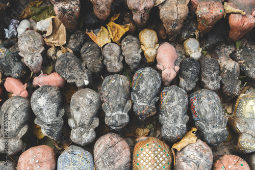 Canvas Print Many elephants statues.  The wood army of souvenir elephants.