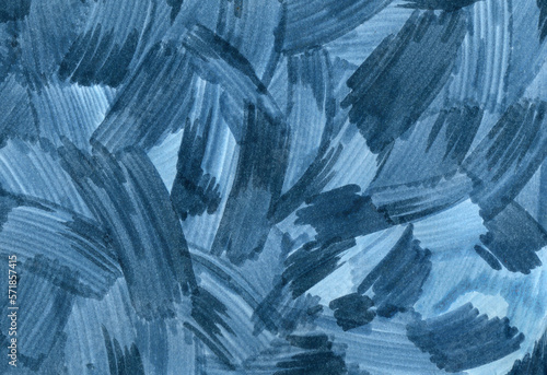 Abstract marker strokes on paper. Blue background