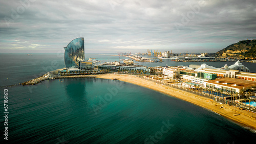 Photography Aerial view of Barcelona Beach with the W hotels at the end of the bay