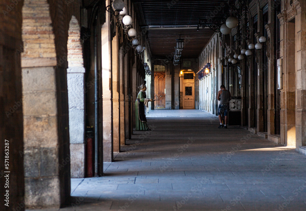 Arched colonnade by the historic Plaza del Castillo square in Old Town, Pamplona