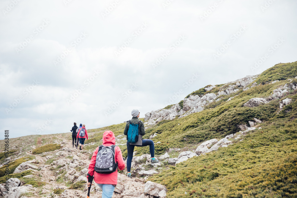 people climb mount rocks travel hiking on foot