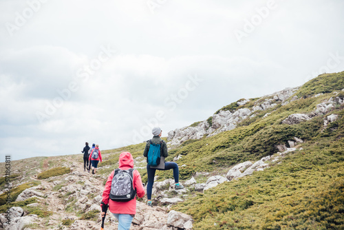 people climb mount rocks travel hiking on foot