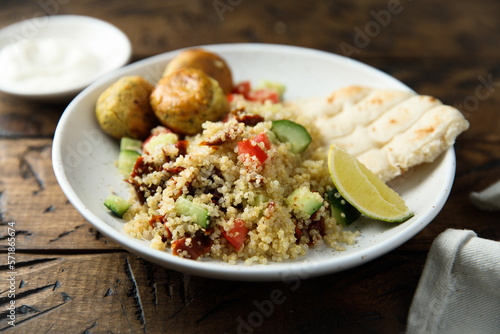 Falafel with warm couscous salad