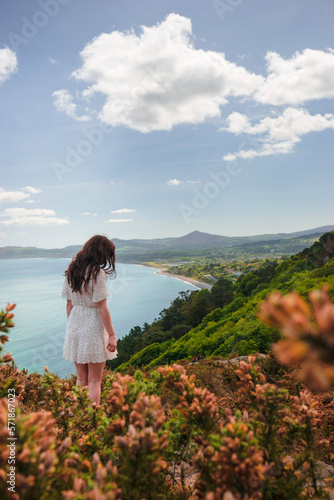 Photography Woman standing over Dublin Bay
