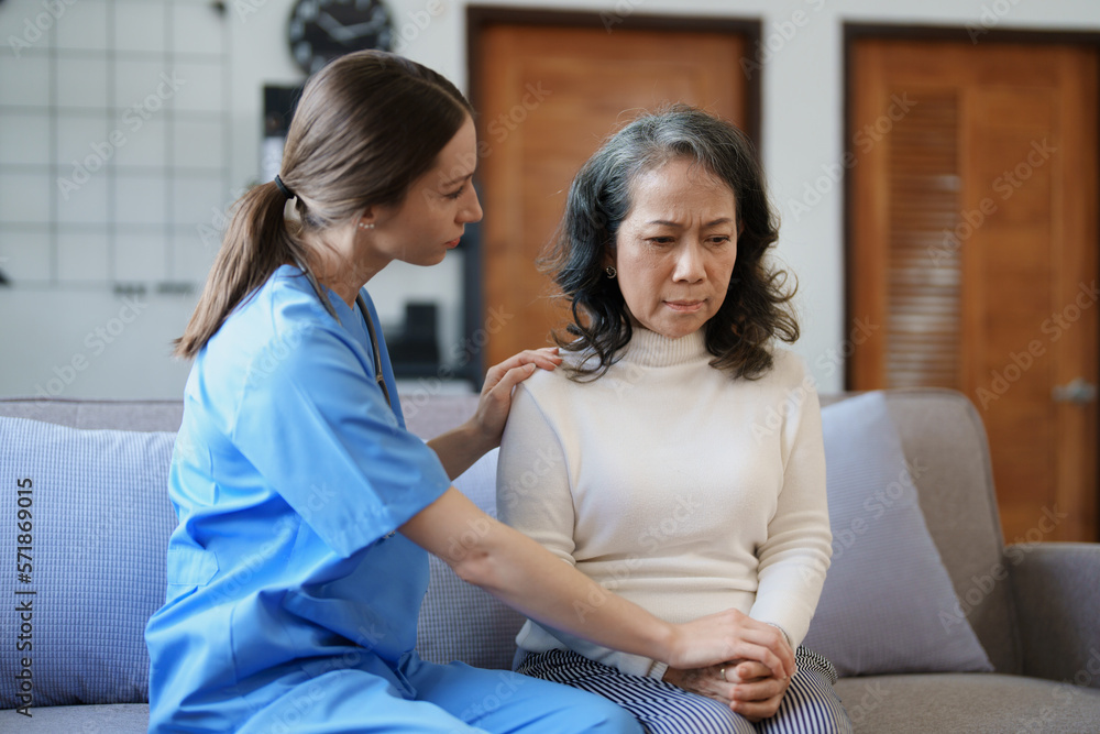 Portrait of a female doctor holding a patient's hand to encourage the fight against disease. Portrait of a female doctor holding a patient's hand to encourage the fight against disease.