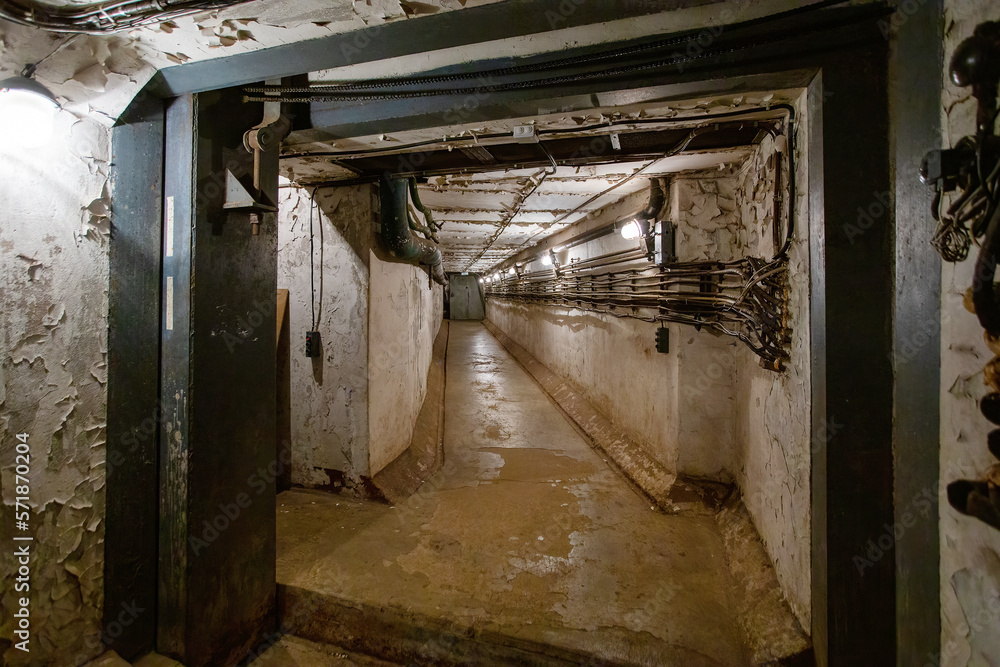 Abstract dark corridor of military bunker interior, grungy old