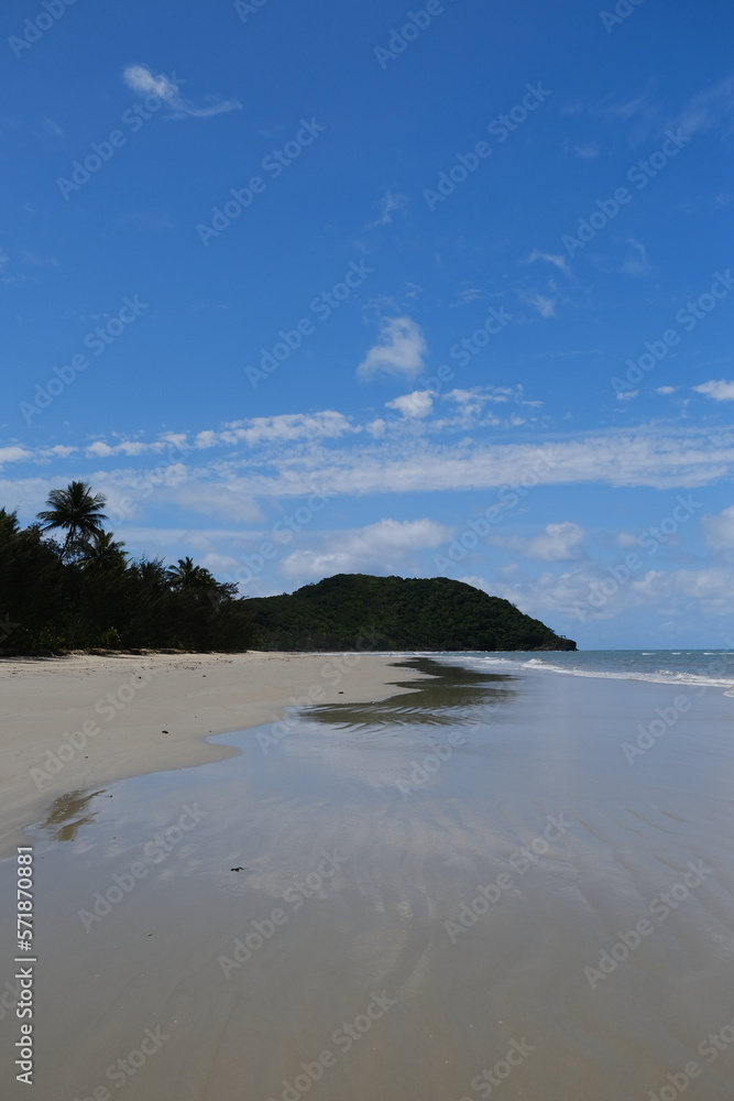 Beautiful Beach view with clouds, rocks and in the jungle 