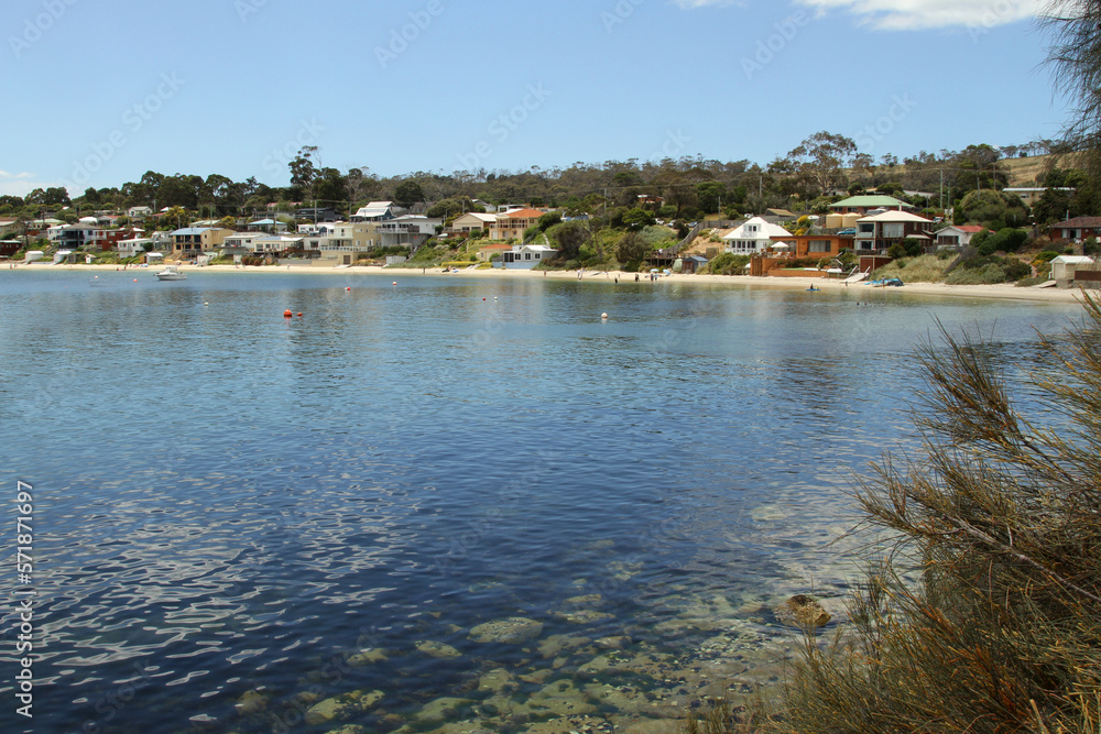 A view to Opossum Bay and the white sand beach on a beautiful warm summers day. Family fishing and safe swiimming location near Hobart Tasmania.