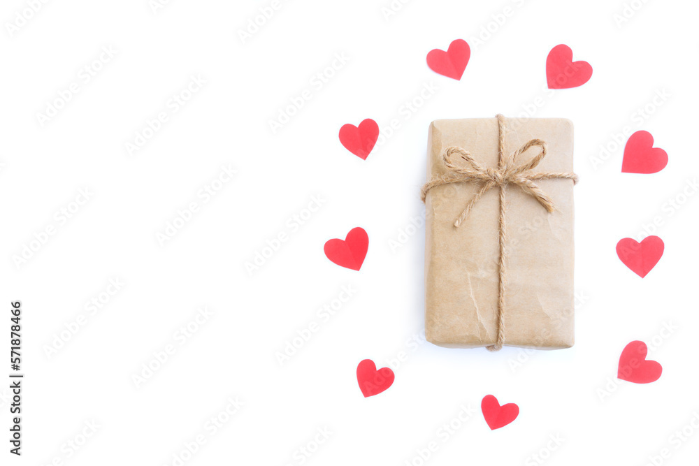 Brown gift box with brown jute rope bow and Red Heart shape papercut on white background Brown gift box with brown jute rope bow and Red Heart shape papercut on white background