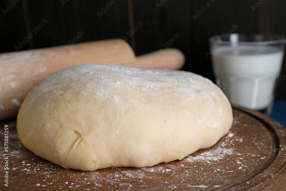 Fresh yeast dough with flour on table, closeup Fresh yeast dough with flour on table, closeup
