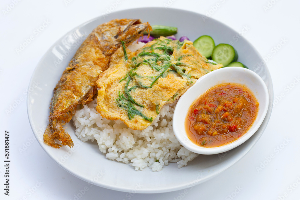 Rice with spicy shrimps chili paste and  fried mackerel fish, fried egg with climbing wattle and vegetables