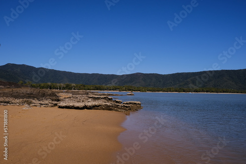 view over the ocean with Christal clear blue water on the background and a blue cloudless sky