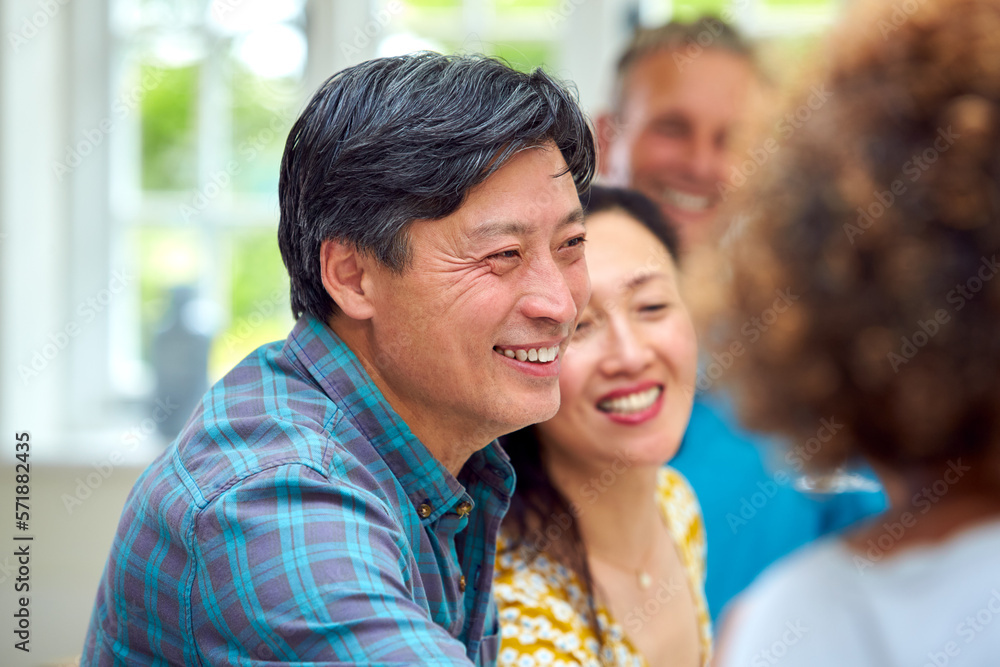 Group Of Multi-Cultural Senior Friends On Summer Vacation Meeting For Drinks In Holiday Apartment Group Of Multi-Cultural Senior Friends On Summer Vacation Meeting For Drinks In Holiday Apartment