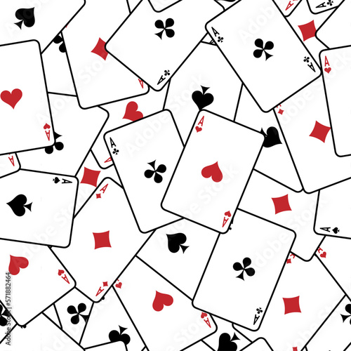 Pattern with playing cards. Playing cards scattered on the table. Suits of playing cards. Spades, Hearts, Clubs, Diamonds.