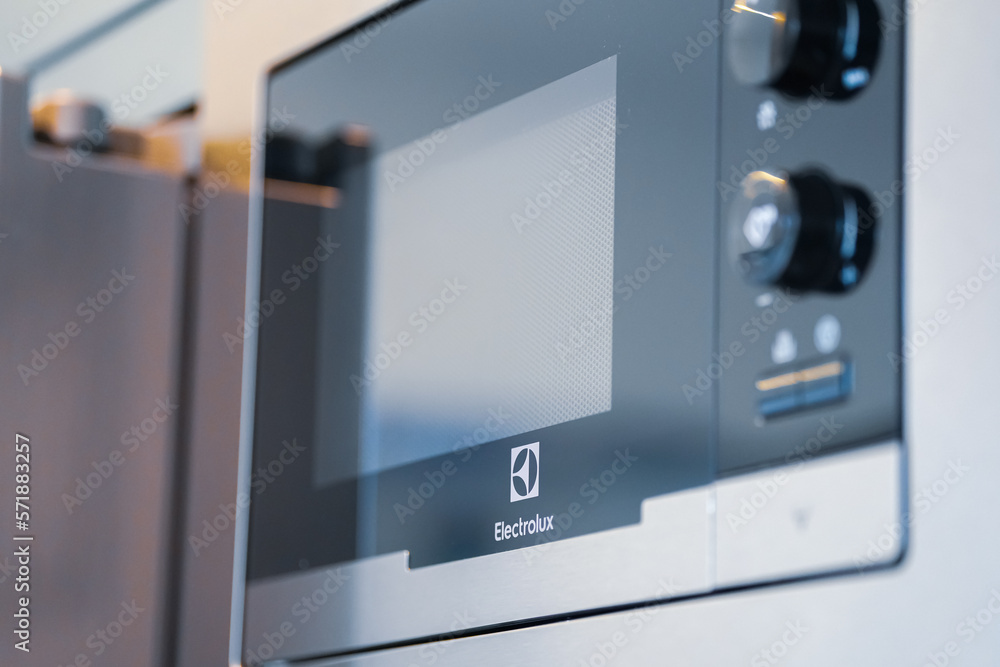 Close up view of a microwave oven made by Electrolux company. Kitchen