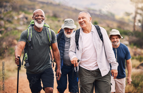 Hiking, smile and group of old men on mountain for fitness, trekking and backpacking adventure. Explorer, discovery and expedition with senior friends walking for health, retirement and journey photo