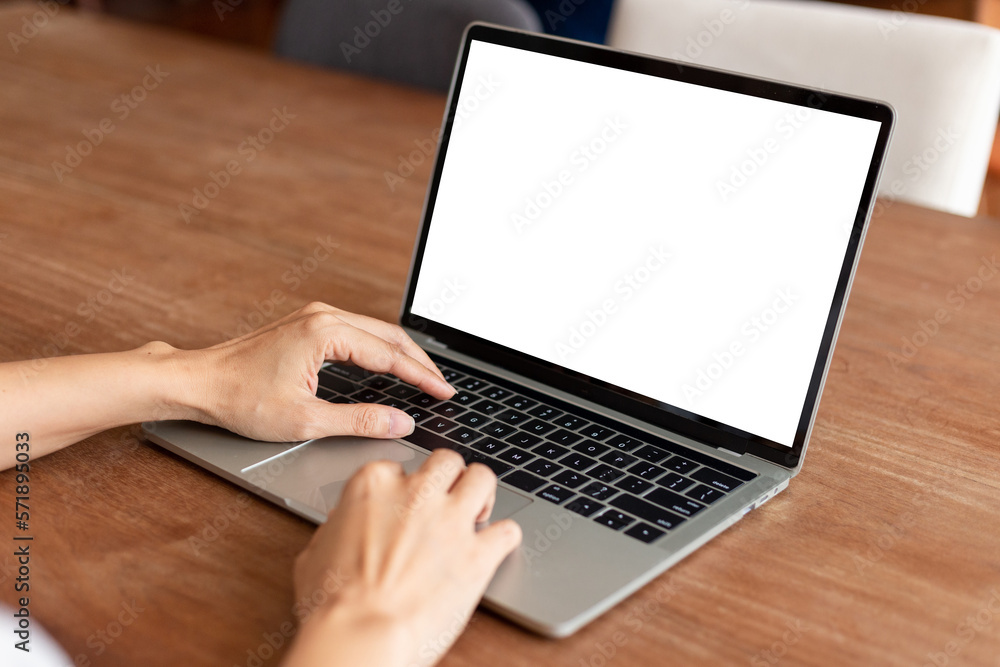 computer screen blank mockup.hand woman work using laptop with white background for advertising,contact business search information on desk at coffee shop.marketing and creative design computer screen blank mockup.hand woman work using laptop with white background for advertising,contact business search information on desk at coffee shop.marketing and creative design