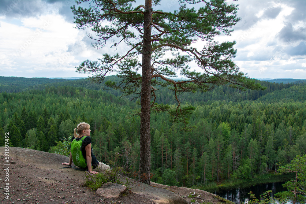 Woman hiking in Lapland Finland Woman hiking in Lapland Finland