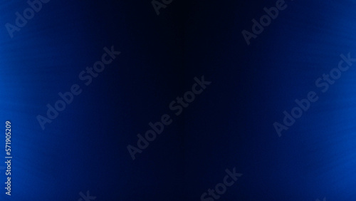 Fondo abstracto con detalle, patron geometrico y degradado de luz y sombra sobre color azul oscuro y negro