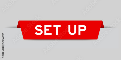 Red color inserted label with word set up on gray background