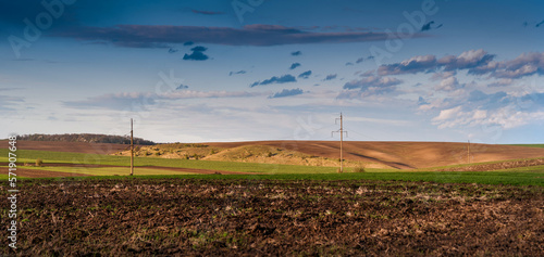 A panoramic view of the arable soil before planting. a plowed field prepared ...