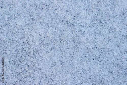 Frosty texture of snow, background from snow close-up. Place for text