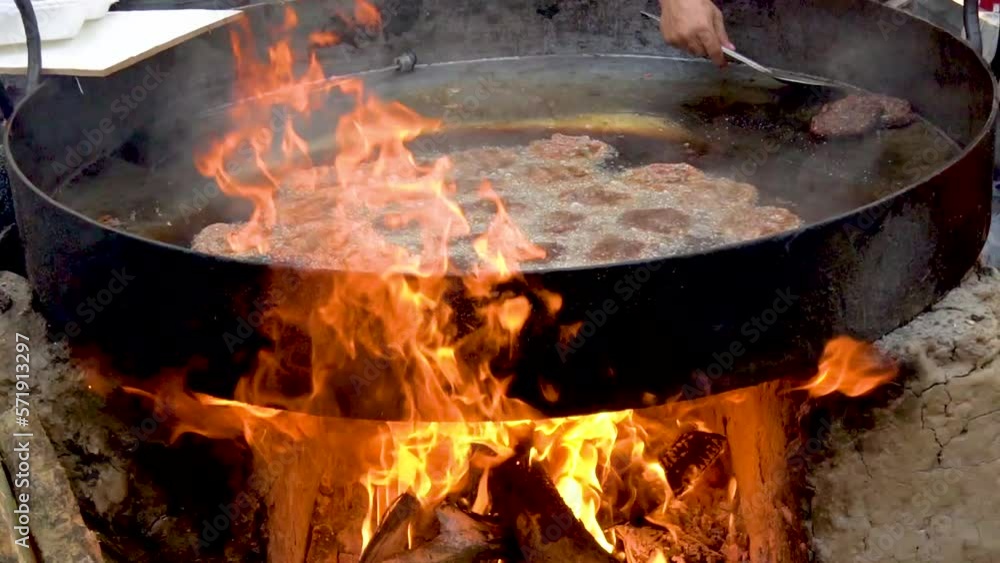 Slow motion shot of cooking of traditional Pakistani food Slow motion shot of cooking of traditional Pakistani food