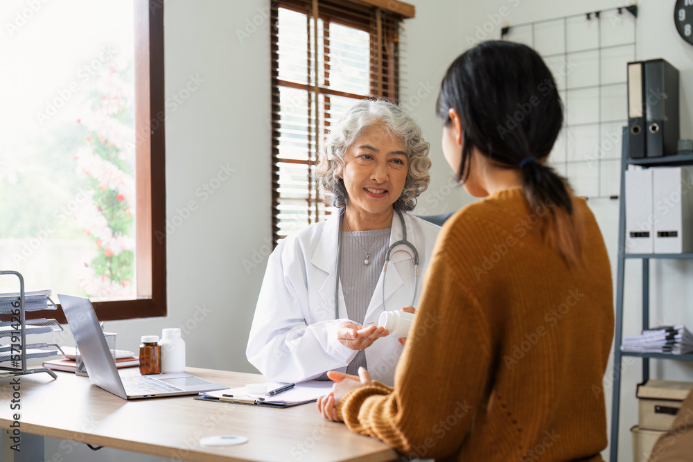 Doctor and patient are discussing at clinic. Digital healthcare and network connection, Data analysis concept Doctor and patient are discussing at clinic. Digital healthcare and network connection, Data analysis concept