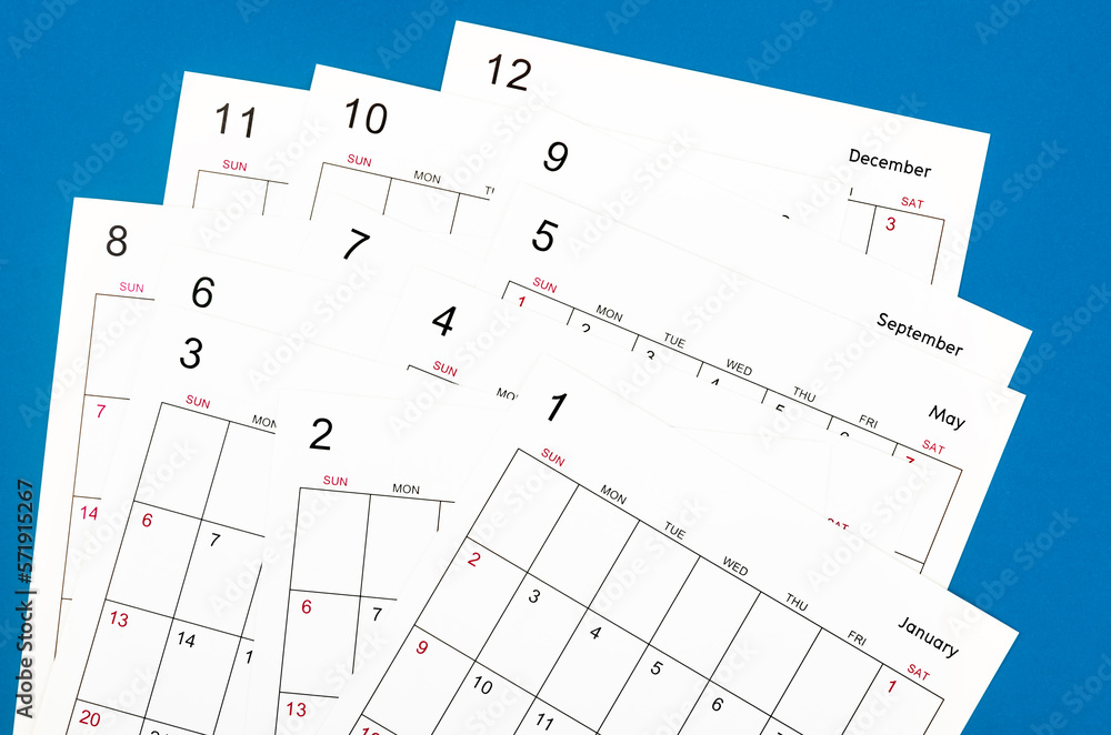 The Many calendar page on blue background business schedule planning appointment meeting concept. The Many calendar page on blue background business schedule planning appointment meeting concept.
