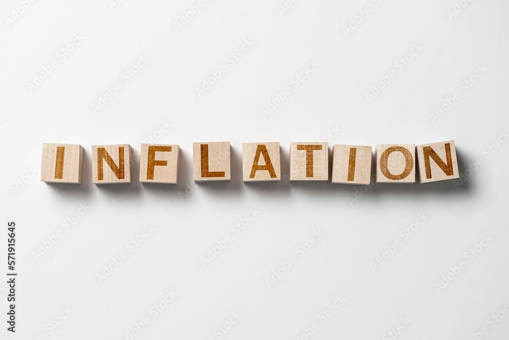the inflation word made on the wooden cubes, concept of economy and investment the inflation word made on the wooden cubes, concept of economy and investment