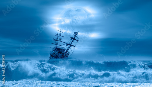 Sailing old ship in storm sea at sunset - Night sky with moon in the clouds "Elements of this image furnished by NASA