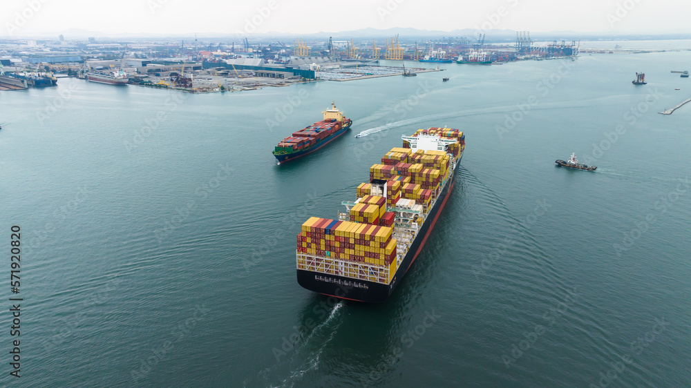 aerial view cargo container ship sailing in sea to import export goods transportation and commercial port background