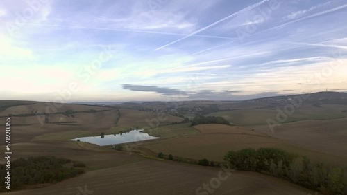 Aerial view of beautiful country landscape. Drone footage of rural countryside with colourful fields.