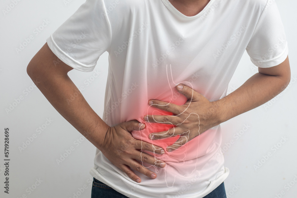 man having abdominal pain on white background man having abdominal pain on white background