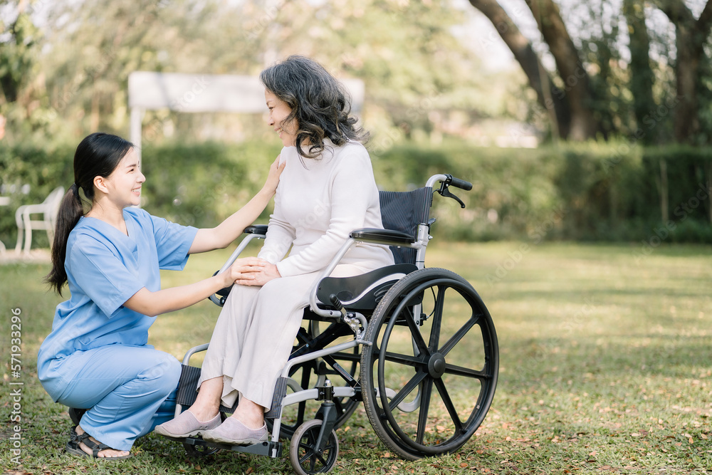 Nurse consulting senior woman holding her hand. Nurse consulting senior woman holding her hand.