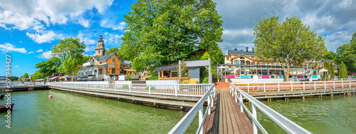 Canvas-taulu Panoramic cityscape  with embankment and marina in Naantali town at sunny summer day