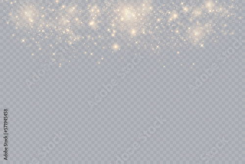 Golden glitter.Light effect.Glittering particles background. Gold dust on a transparent background.