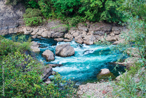 The river Adda with the rocky rocks of the Prealp, famous for the fact that Leonardo da Vinci painted here a landscape of the Madonna in the rocks. Lombardy, Italy photo