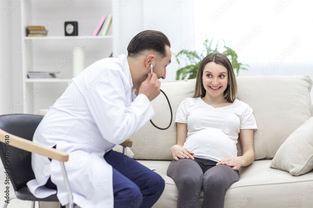 Photo of pregnant woman speaking with a doctor. Photo of pregnant woman speaking with a doctor.