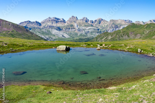 Lakes of Astun hike and views of the valley in Aragon pyrenees mountains in summer in a suuny day photo