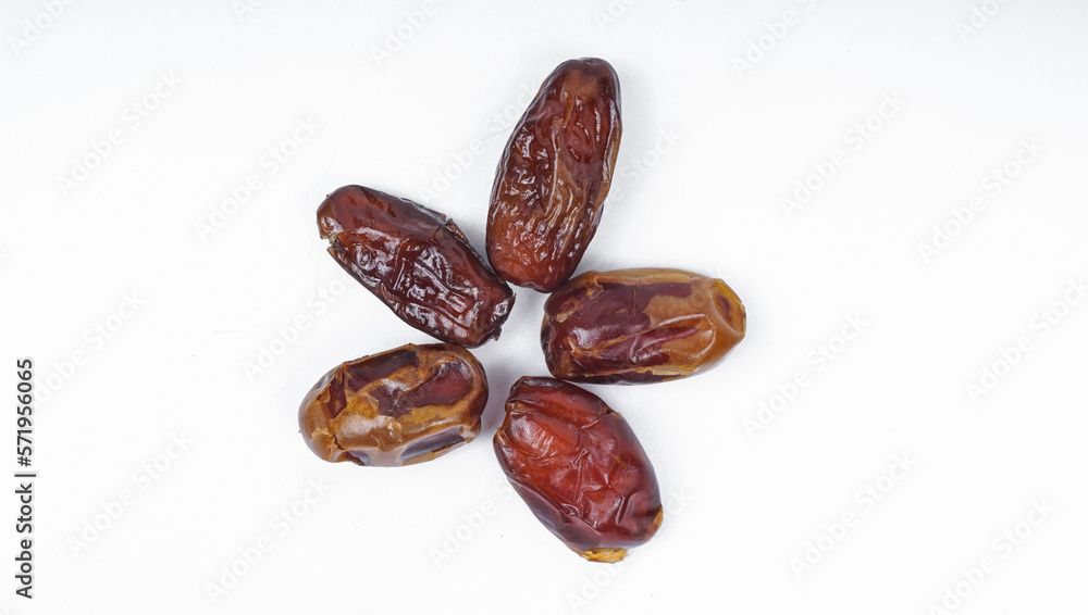 Flat lay concept - Dried sliced date fruit on white background. Flat lay concept - Dried sliced date fruit on white background.