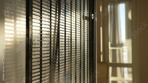 Wallpaper Mural Close-up side view of unrecognizable male in rubber gloves removing dust and dirt with hot steam from fridge radiator grill using steam cleaner in sunlight at home. Shooting in slow motion. Torontodigital.ca