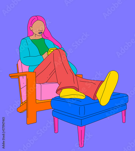 Nervous girl texting on a chair with her legs up on a purple background photo