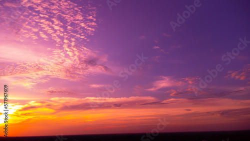 Amazing panoramic sunrise or sunset sky with gentle colorful clouds. Long panorama, crop it. 