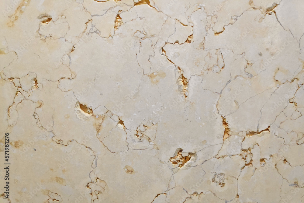 Naklejka premium Polished beige limestone background