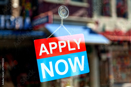 Apply now sign in a store window