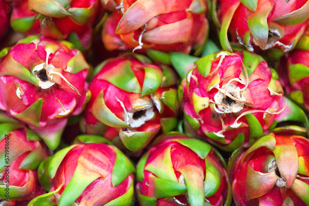 Stack of dragon fruits on a market stall Stack of dragon fruits on a market stall