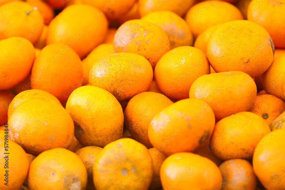 Stack of clementines on a market stall