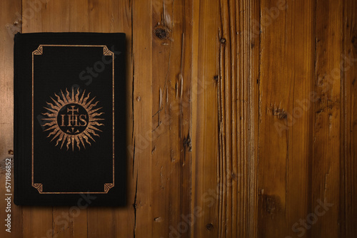 Christian book on a wooden desk photo