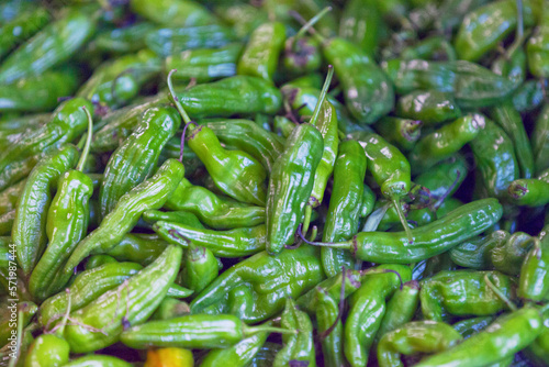Stack of Gros piments on a market stall.